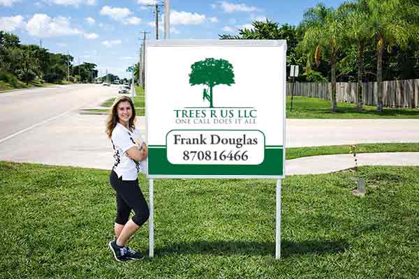 4x4 outdoor business sign with patented post pockets and metal post kit installed outdoors