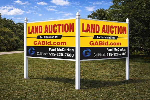 Auctioneer Signs installed outdoors