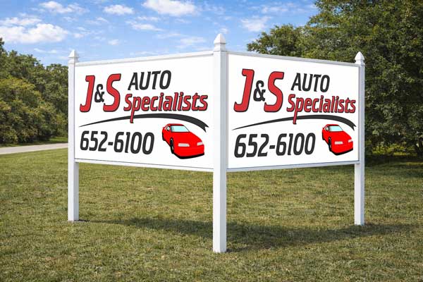 4x8 auction sign mounted in arrow post for auction listing