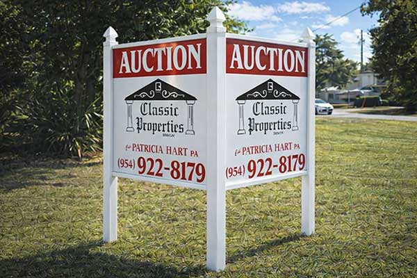 4x4 commercial real estate sign with arrow post kit installed outdoors