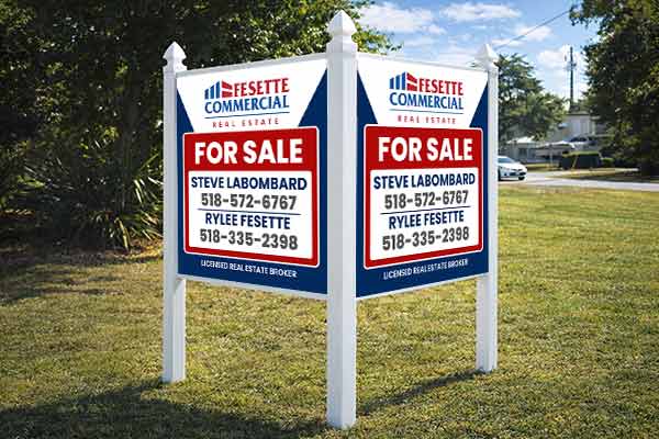 4x4 auction sign with arrow post kit installed outdoors