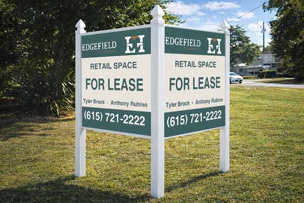 4x4 for lease sign with arrow post kit installed outdoors