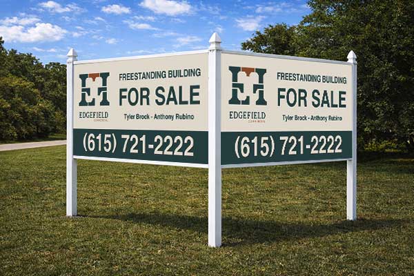 4x8 for sale sign mounted in arrow post for auction listing