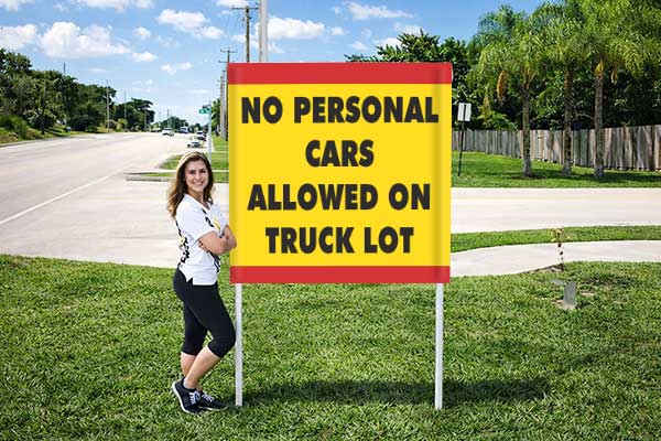 4x4 auction sign with metal post kit installed outdoors