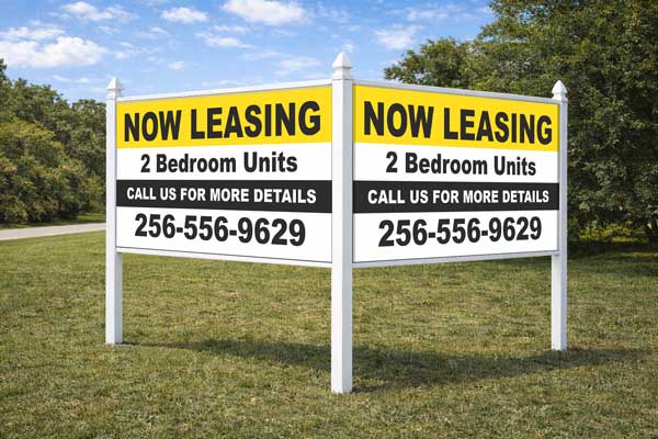 4x8 real estate sign mounted with Arrow Post Kit for two-panel V-shaped display
