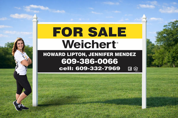 4x8 Weichert Realtors real estate sign installed outdoors